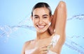 Beauty, portrait and woman with razor for shaving armpit with foam, cleaning products and water in studio. Skincare Royalty Free Stock Photo