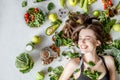 Portrait of a beautiful woman with healthy food