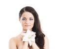 Beauty portrait of a young, attractive woman with a lily flower Royalty Free Stock Photo