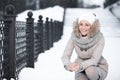 Beauty portrait of young attractive woman over snowy Christmas background Royalty Free Stock Photo