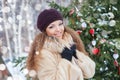 Beauty portrait of young attractive woman over snowy Christmas Royalty Free Stock Photo