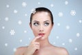 Beauty portrait of young beautiful woman over snowy Royalty Free Stock Photo