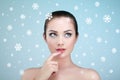 Beauty portrait of young beautiful woman over snowy Royalty Free Stock Photo