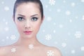 Beauty portrait of young beautiful woman over snowy Royalty Free Stock Photo