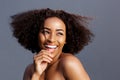 Beauty portrait of young black female fashion model laughing