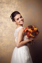 Beauty portrait of young bride. Perfect makeup and hairstyle. Royalty Free Stock Photo