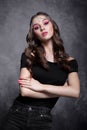 Beauty portrait of young woman. Brunette girl with evening female makeup and black T-shirt Royalty Free Stock Photo