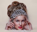 Beauty portrait of young woman with creative fashion hairstyle. Royalty Free Stock Photo