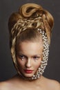 Beauty portrait of young woman with creative fashion hairstyle. Royalty Free Stock Photo
