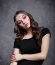 Beauty portrait of young woman. Brunette girl with evening female makeup and black T-shirt Royalty Free Stock Photo