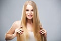 Beauty portrait of young woman with healthy skin and soft natural make up. Spa and care. Long blonde hair