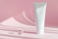 Beauty product mockup. Wellness packaging. Branding spa. Cosmetic on pink shadow background. Cream bottle, lotion