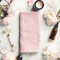 Beauty Products. Facial Roller, essential oils, towel and beautiful peonies on white marble background