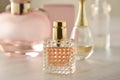 Beauty products. Perfume or parfume bottle on marble background. Copy space.