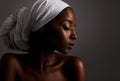 Beauty, profile and black woman in dark studio with head scarf, skincare and pride in culture. Cosmetics, skin glow and Royalty Free Stock Photo