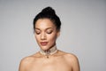 Beauty profile portrait of beautiful mixed race woman wearing chocker Royalty Free Stock Photo