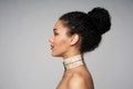 Beauty profile portrait of beautiful mixed race woman wearing chocker Royalty Free Stock Photo