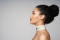 Beauty profile portrait of beautiful mixed race woman wearing chocker Royalty Free Stock Photo