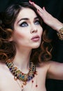 Beauty rich woman with luxury jewellery looks like mature close Royalty Free Stock Photo