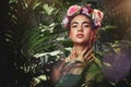 Beauty, rose and crown portrait of woman with tropical palm plants and natural makeup cosmetics. Flowers, headband and