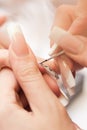 Beauty salon: Manicure, painting on nail Royalty Free Stock Photo