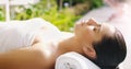 Beauty, salon and woman relax at spa for massage, facial treatment and luxury pamper. Aesthetic, dermatology and person