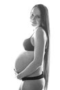 Beauty brunette pregnant woman isolated black and white portrait, tenderness people concept Royalty Free Stock Photo