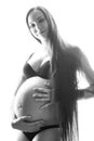 Beauty brunette pregnant woman isolated black and white portrait, tenderness people concept Royalty Free Stock Photo