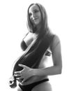 Beauty brunette pregnant woman isolated black and white portrait, tenderness people concept Royalty Free Stock Photo