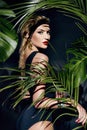 Beauty woman makeup jungle palm sun tan shadows beach