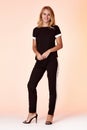 Beauty sexy woman wear stylish casual clothing for meeting walk silk blouse cotton pants high heels shoes perfect body shape