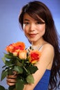 Beauty shot young Japanese girl holding flowers Royalty Free Stock Photo