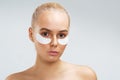 Beauty shot of a young woman with undereye mask Royalty Free Stock Photo