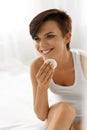 Beauty Skin Care. Woman Removing Face Makeup Using Cotton Pad Royalty Free Stock Photo