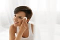 Beauty Skin Care. Woman Removing Face Makeup Using Cotton Pad Royalty Free Stock Photo