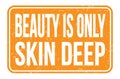 BEAUTY IS ONLY SKIN DEEP, words on orange rectangle stamp sign Royalty Free Stock Photo