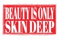 BEAUTY IS ONLY SKIN DEEP, words on red grungy stamp sign Royalty Free Stock Photo