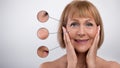 Beauty and skincare. Collage of attractive senior woman with zoomed zones showing skin aging signs, light background Royalty Free Stock Photo