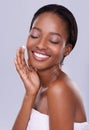 Beauty, skincare and face of black woman with cream, smile and natural makeup in studio. Happy, dermatology and luxury Royalty Free Stock Photo