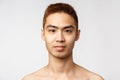 Beauty, skincare and men health concept. Headshot of handsome young asian man with no blemishes, perfect skin condition Royalty Free Stock Photo