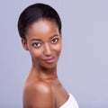 Beauty, skincare and portrait of happy black woman with glowing skin, natural spa makeup and studio mockup. Smile