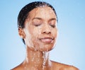 Beauty, skincare and shower with black woman and water splash for cleaning, hydration and natural cosmetics. Moisture Royalty Free Stock Photo