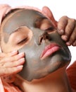 Beauty-spa. Applying of cosmetic mud mask. Royalty Free Stock Photo