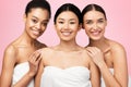 Three Gorgeous Girls Posing In Bath Towels On Pink Background Royalty Free Stock Photo