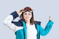 Beauty sport girl. Snowboard jacket. Pretty young woman in fitness clothes