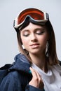 Beauty sport girl. Snowboard jacket. Pretty young woman in fitness clothes Royalty Free Stock Photo