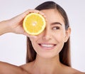 Beauty, studio face and happy woman with lemon for skincare glow, vitamin c detox and natural facial exfoliation. Fruit Royalty Free Stock Photo