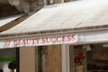 Beauty Success logo letter text on entrance wall store Group shop French brand chain