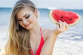 Beauty teenage model girl eating watermelon Royalty Free Stock Photo
