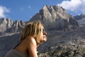 The woman traveling to the mountains, precisely in the Belluno Dolomites, towards Cortina D`ampezzo. Royalty Free Stock Photo